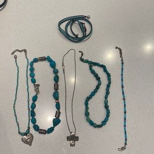 Assorted silver and turquoise jewelry.